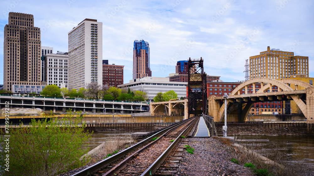 St. Paul City in Minnesota, skyline, skyscrapers, and railroad over Mississippi River in the Upper Midwestern United States