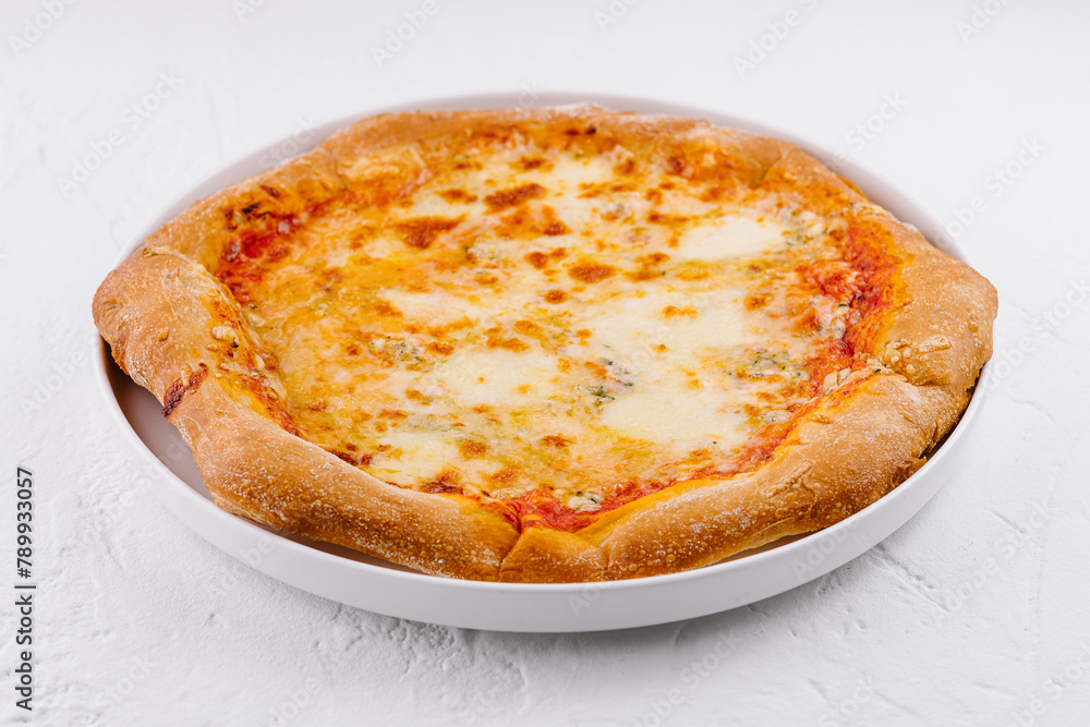 Fresh cheese pizza on white plate Fresh cheese pizza on white plate