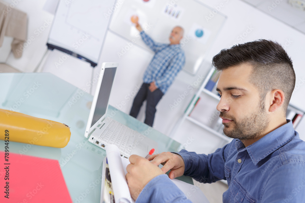 portrait of young man studying portrait of young man studying