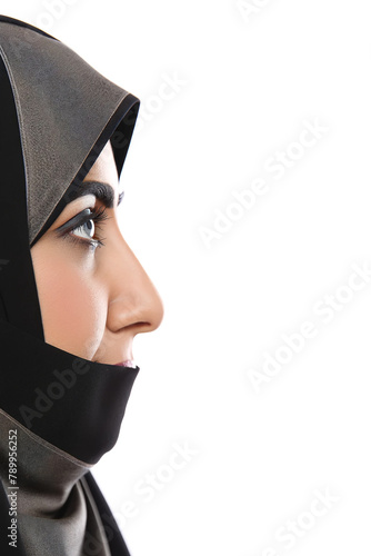 Profile of a beautiful Arab woman wearing a black hijab on a white background