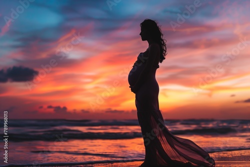 Elegant Pregnant Woman on Beach at Dusk
