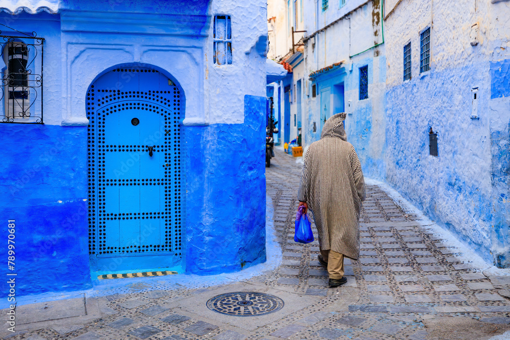 Chefchaouen, Morocco. The old walled city, or medina with its traditional houses painted in blue and white.