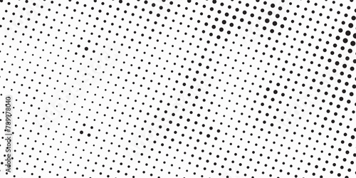 Halftone faded gradient texture. Grunge halftone grit background. White and black sand noise wallpaper. Retro pixilated vector backdrop photo