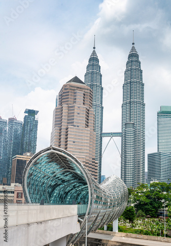 Photography Saloma Link pedestrian bridge,beautiful example of modern architecture,with KL city backdrop,Kuala Lumpur,Malaysia