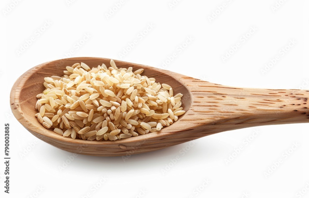 Tokyo brown rice on a wooden spoon isolated on a white background. Tokyo brown rice on a wooden spoon isolated on a white background.