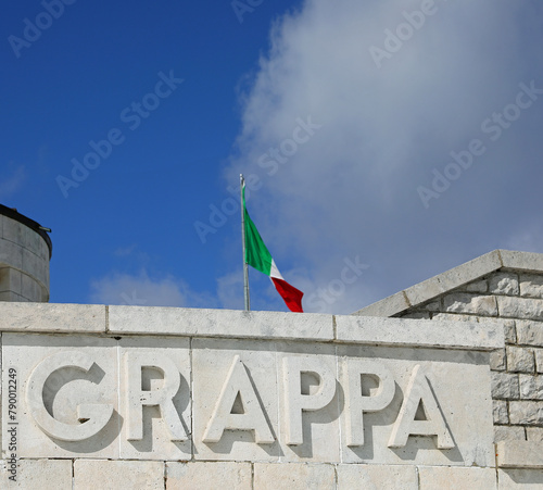 Pieve, TV, Italy - March 13, 2024: Text on Italian Military Memorial that means the place Grappa Mount of First World War photo