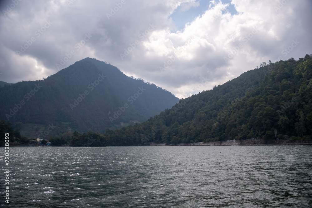 Sarangan Lake, also known as Telaga Pasir, is a natural lake at an altitude of 1,200 meters above sea level and is located on the slopes of Mount Lawu, Plaosan District, Magetan Regency, East Java. Sarangan Lake, also known as Telaga Pasir, is a natural lake at an altitude of 1,200 meters above sea level and is located on the slopes of Mount Lawu, Plaosan District, Magetan Regency, East Java.