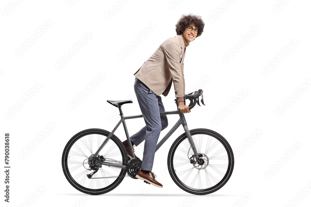 Man riding a bicycle and looking at camera Man riding a bicycle and looking at camera