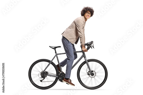 Man riding a bicycle and looking at camera