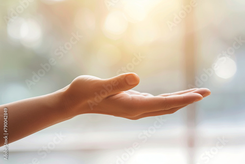 hand offering support and personal assistance, with the background blurred to symbolize focus and clarity in times of need, evoking a sense of reliability and trustworthiness. photo