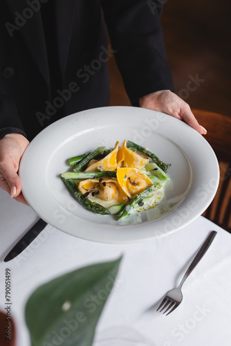 Tortellini with seafood and asparagus. Spring menu, restaurant.
