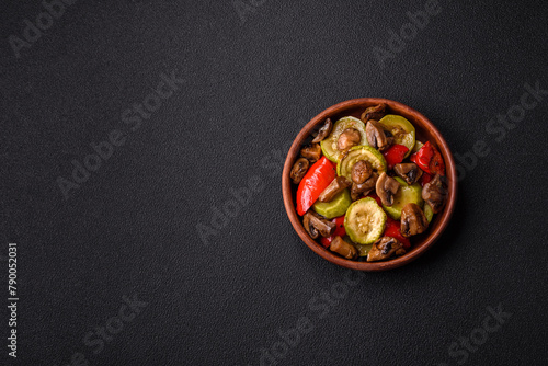 Delicious fresh grilled vegetables zucchini, bell peppers, mushrooms and onions