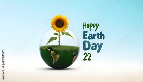 A sunflower growing out of a grassy globe, with the text happy Earth Day April 22 overlaid on the image