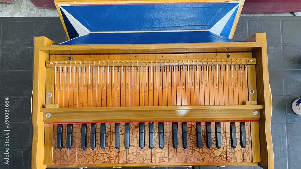 Beautiful Yellow Indian Harmonium. Traditional Indian musical organ