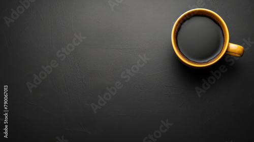 White coffee cup on dark surface. Top view. Isolated on dark background. Room for copy space. 