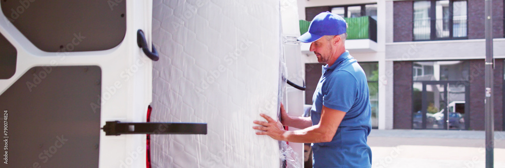 Fotografie Mattress Delivery Truck. Movers Transporting