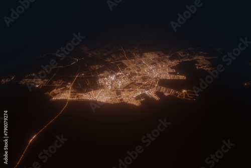 Aerial view on Dammam (Saudi Arabia) from east. Top view on modern city at night from satellite