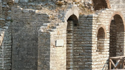 Ruins of Great Basilica in Butrint National Park, Buthrotum, Albania. Triconch Palace at Butrint Life and death of an ancient Roman house Historical medieval Venetian Tower surrounded. Butrint photo