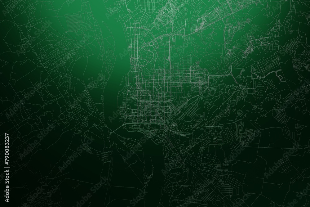 Street map of Tomsk (Russia) engraved on green metal background. Light is coming from top. 3d render, illustration