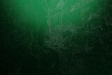 Street map of Tomsk (Russia) engraved on green metal background. Light is coming from top. 3d render, illustration