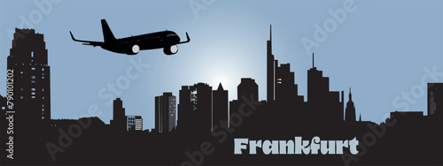 Skyline silhouette of buildings in Frankfurt with passenger Airplane, the financial centre in Frankfurt am Main, Germany
