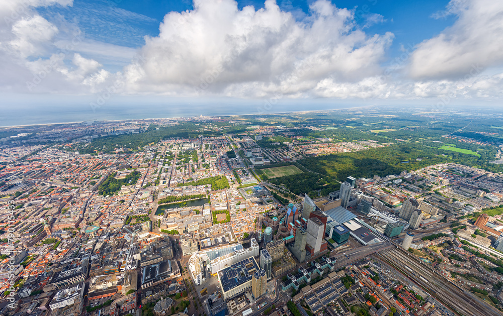Naklejka premium The Hague, Netherlands. Panorama of the summer city in clouds weather. HEAD OVER SHOT. Aerial view