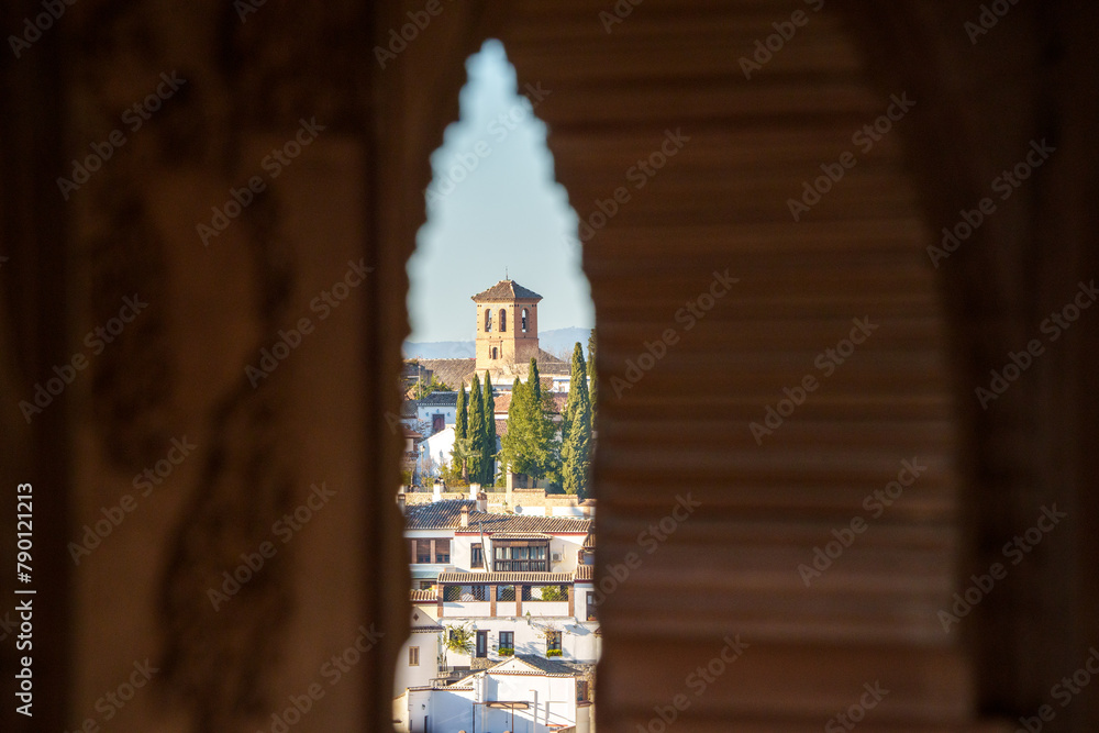 Granada seen through a window of the Alhambra
