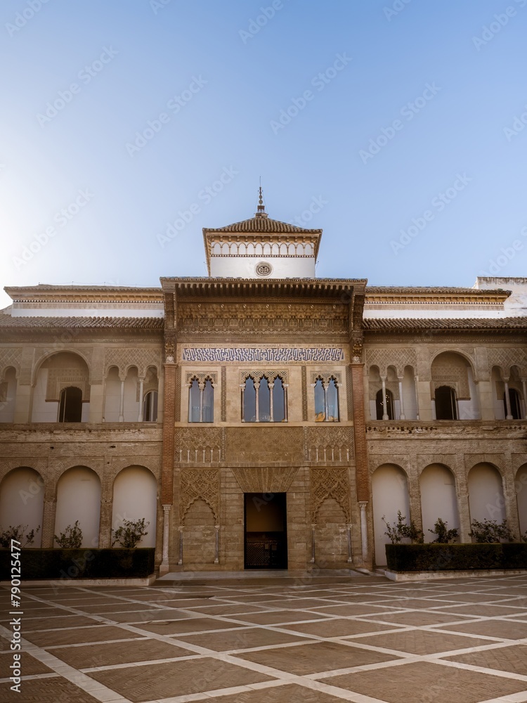 The frontal view of the Royal Palace in the Real Alcazar de Seville, from the Patio de la Monteria