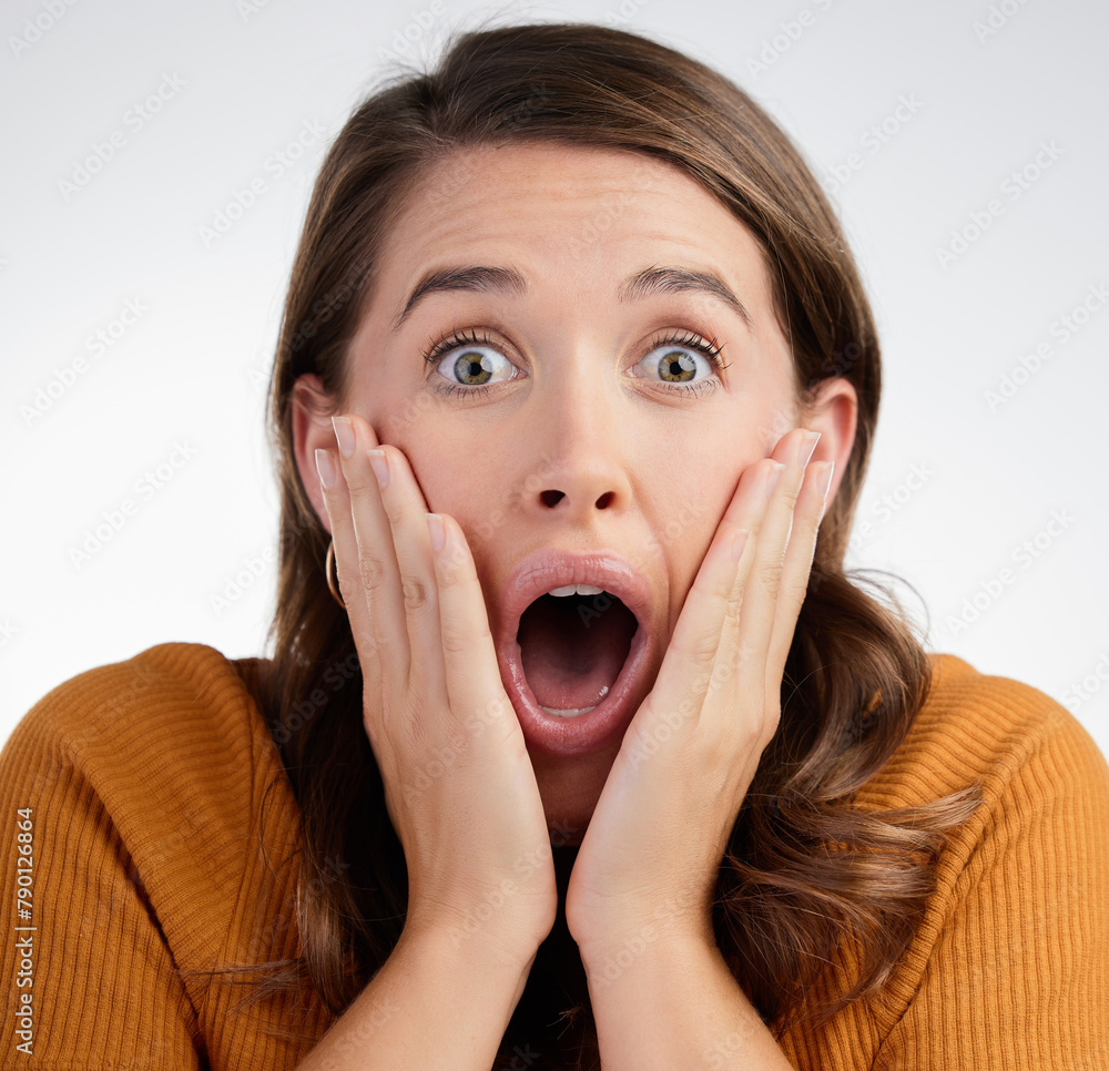 Woman, portrait and shocked with bad news, scared or disbelief on a white studio background. Female person with open mouth in shock, OMG or wtf for alert, surprise rumor or gasp from announcement Woman, portrait and shocked with bad news, scared or disbelief on a white studio background. Female person with open mouth in shock, OMG or wtf for alert, surprise rumor or gasp from announcement