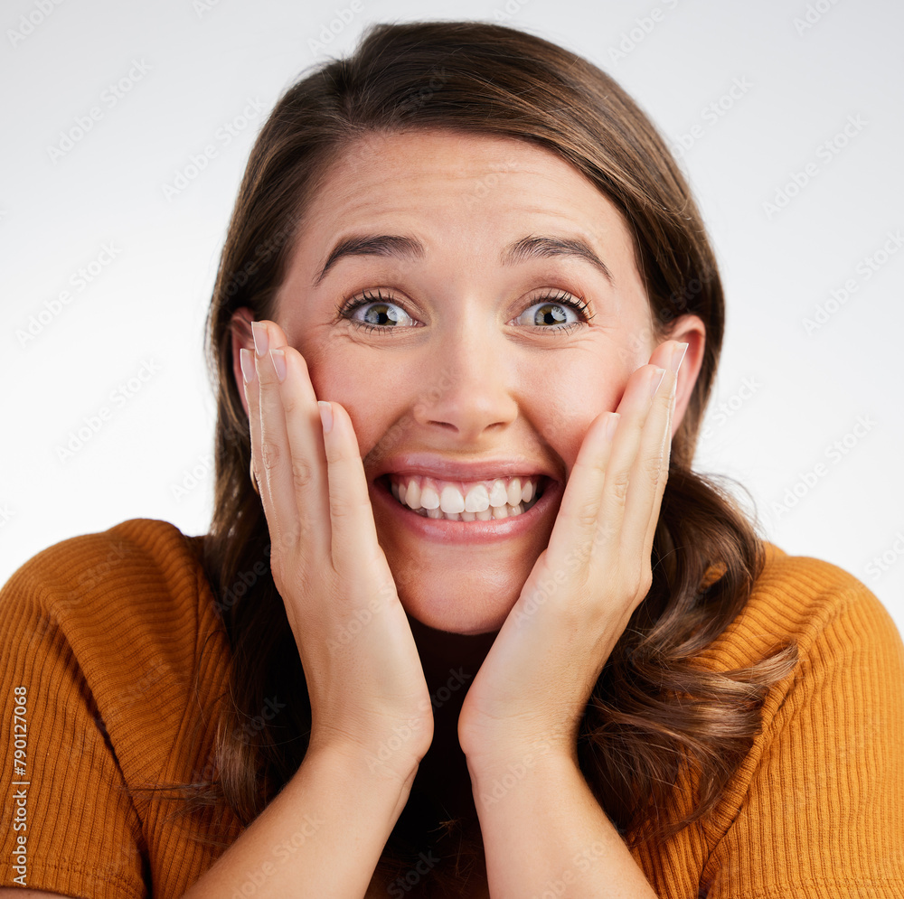 Happy woman, portrait and surprise with good news for prize, announcement or offer on a white studio background. Face of excited female person with big smile in wow, happiness or amazing reaction Happy woman, portrait and surprise with good news for prize, announcement or offer on a white studio background. Face of excited female person with big smile in wow, happiness or amazing reaction