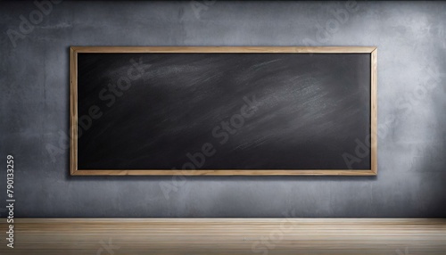 empty blackboard on a grey the wall