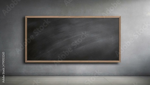 empty blackboard on a grey the wall