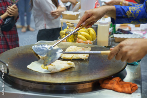 Crispy Roti Vendor at the Street Corner