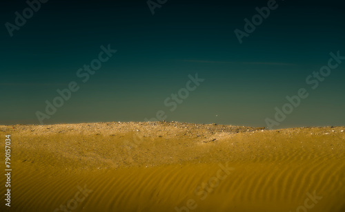 an imaginary desert landscape reminiscent of the arid and surreal atmosphere of the planet Mars