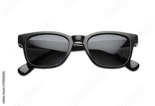 A close-up view of a pair of black rectangular-framed sunglasses with dark lenses