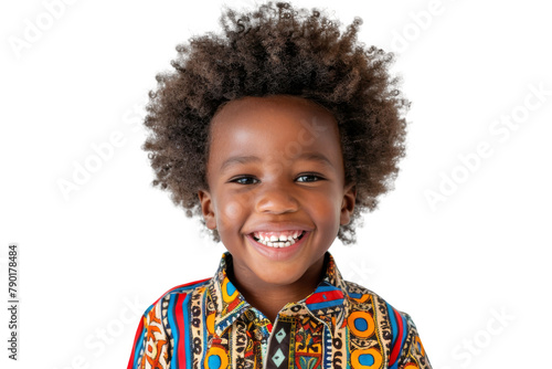 Studio portrait of young African-American little boy with Afro hair, bright colorful shirt and happy smile isolated on transparent png background.