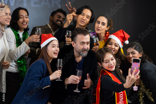 Business people taking selfie - Business party and success celebration. Group of diverse business people colleagues or employees together drinking champagne at event party. achievement