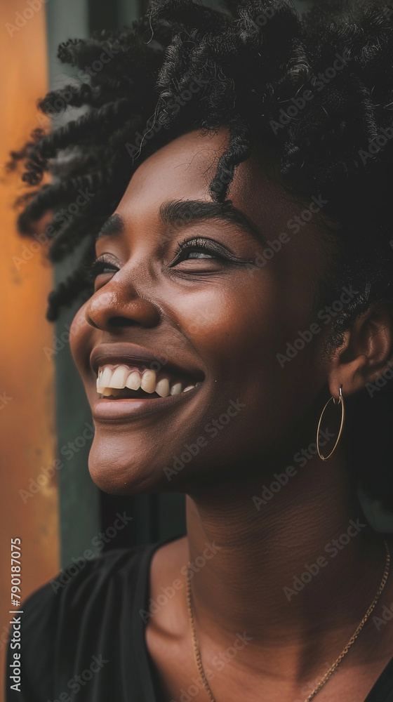 Close-up of a happy black woman smiling