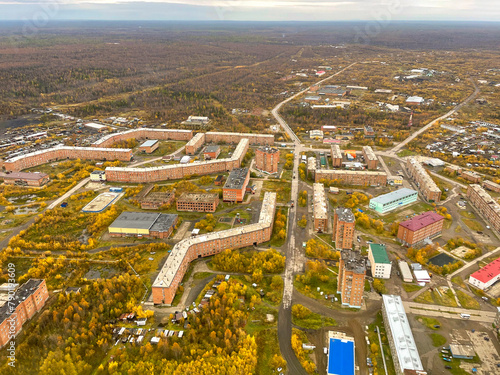 Aerial view to Igarka town at early autumn, Russia. Igarka is a monotown established around a sawmill which processed timber logged in the basin of the Yenisei River for export.