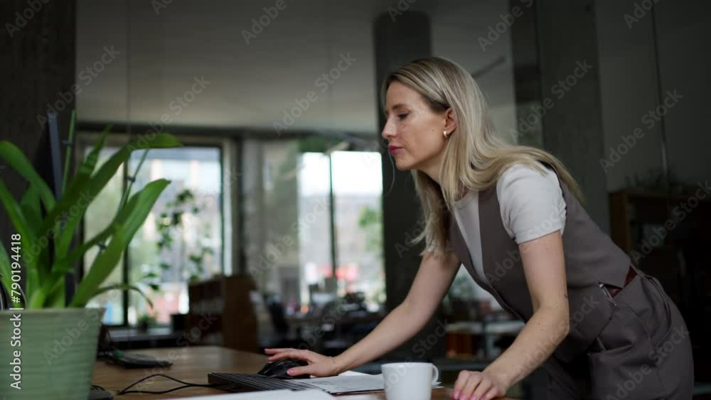 Video of female worker worikng on her laptop in the office. Concept of the corporate work. Video of female worker worikng on her laptop in the office. Concept of the corporate work.