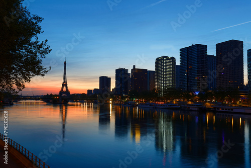 View of Eiffel Tower and river Seine at sunset in Paris, France.