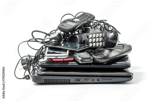 Electronic waste ready to recycle, isolated on white background. pile of mixed electronic waste, old broken computer parts, laptops, cell phones