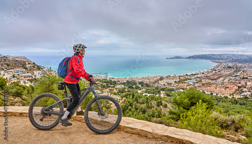 activ senior woman riding h...