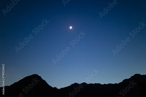 night in the mountains. contrast photo alpine mountains. night sky in the stars. outdoor recreation in the mountains.