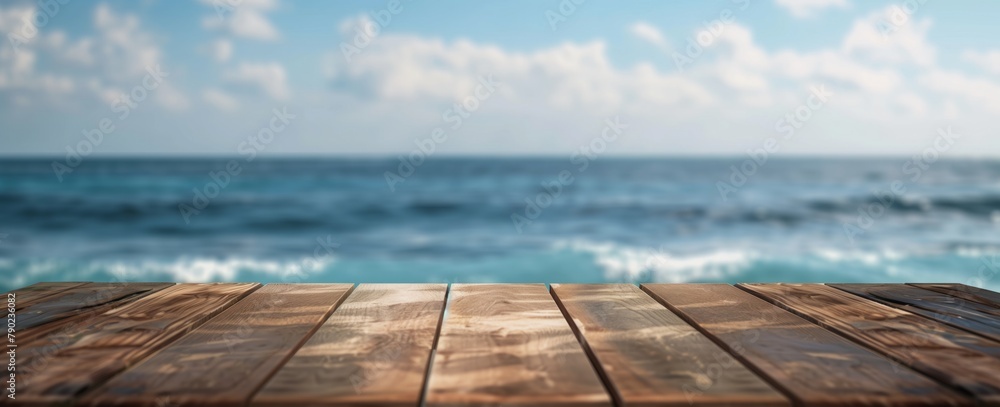 Empty wooden table top with background of blue sea and sky for product display, summer concept.