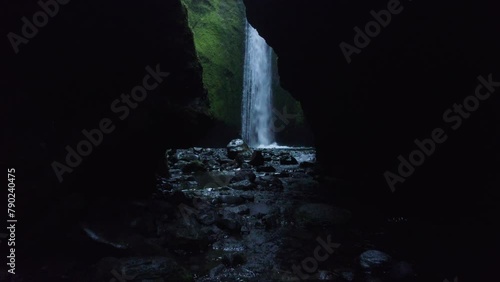 Secret Waterfall Canyon Cave Nauthusagil Iceland. Drone Over Water Steam Towards Opening Moss Covered Walls. photo