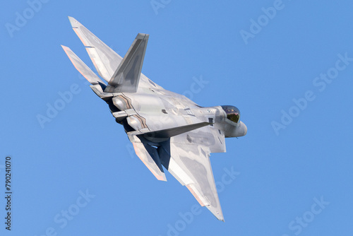 Very close tail  view of a F-22 Raptor in beautiful light