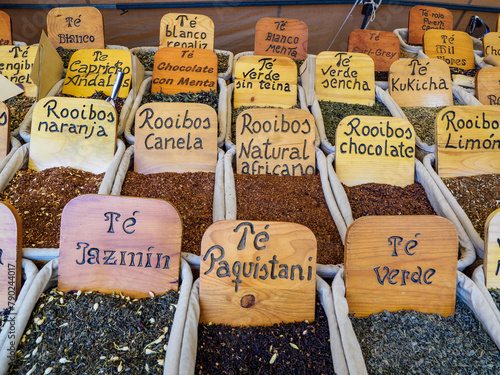 Market stand with condiments on a market in Montefrio village photo