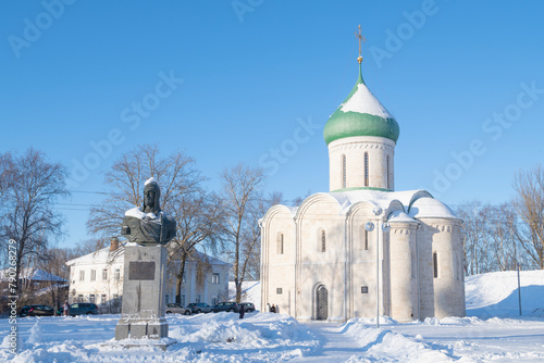 View of the monument to Prince Alexander Nevsky and the medieval Spaso-Preobrazhensky Cathedral on a sunny January day, Pereslavl-Zalessky. Golden Ring of Russia