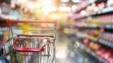 Shopping cart in supermarket and blurred photo store bokeh background